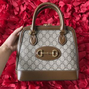 背高档的包包看得出吗Horsebit1955小号手提包棕色贝壳包